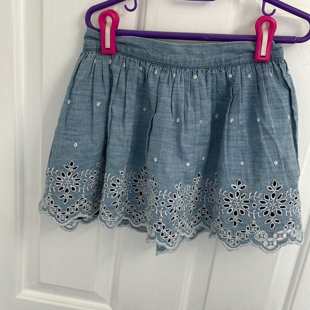 Girls denim skirt from the gap size small. Elastic waist.